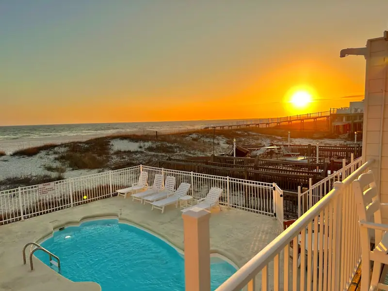 Sunset over the pool and Gulf